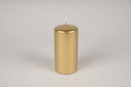 A009RP Box of 8 gold cylinder candles D6cm H12cm